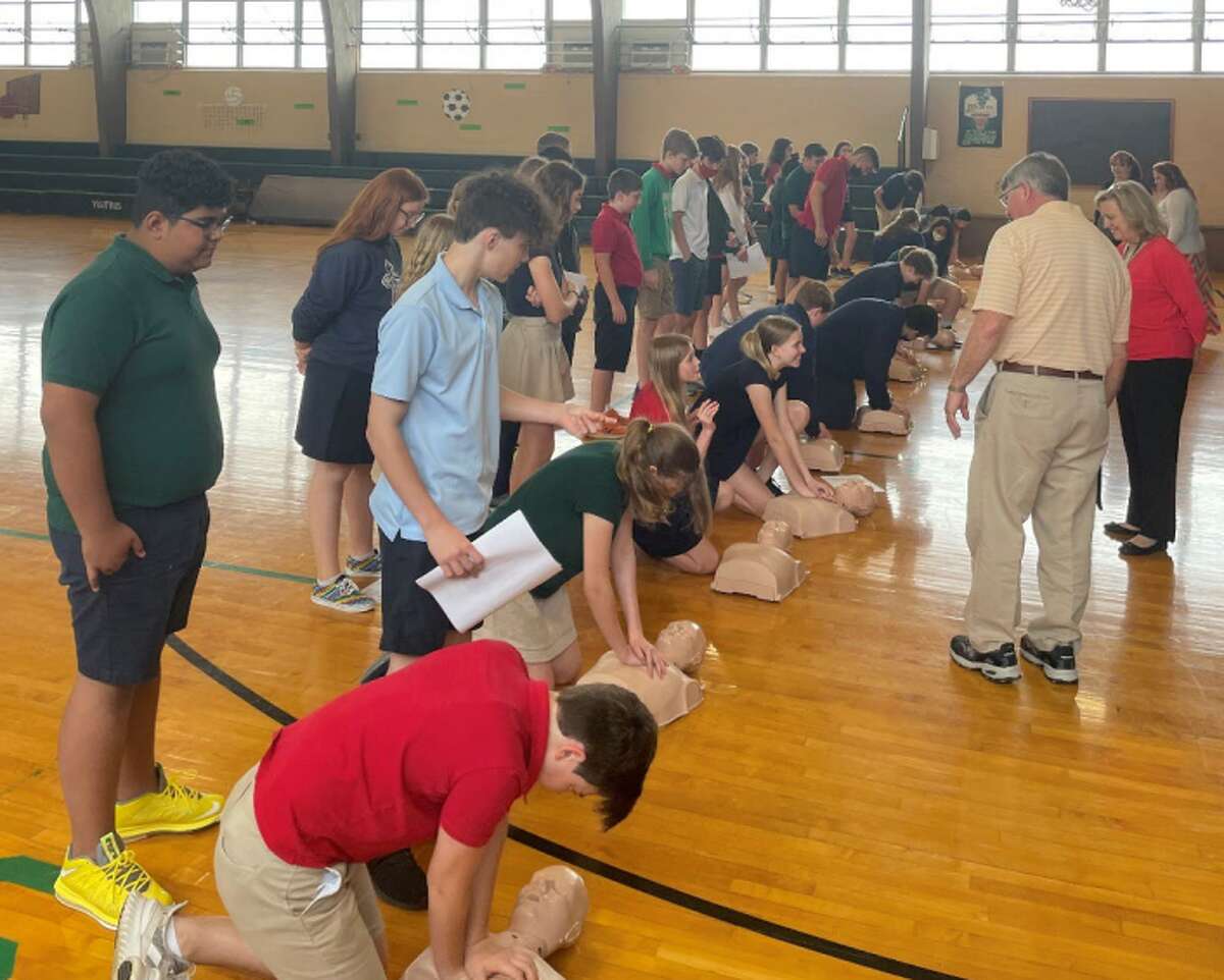 CPR training being taught at local schools by Collinsville firefighters.