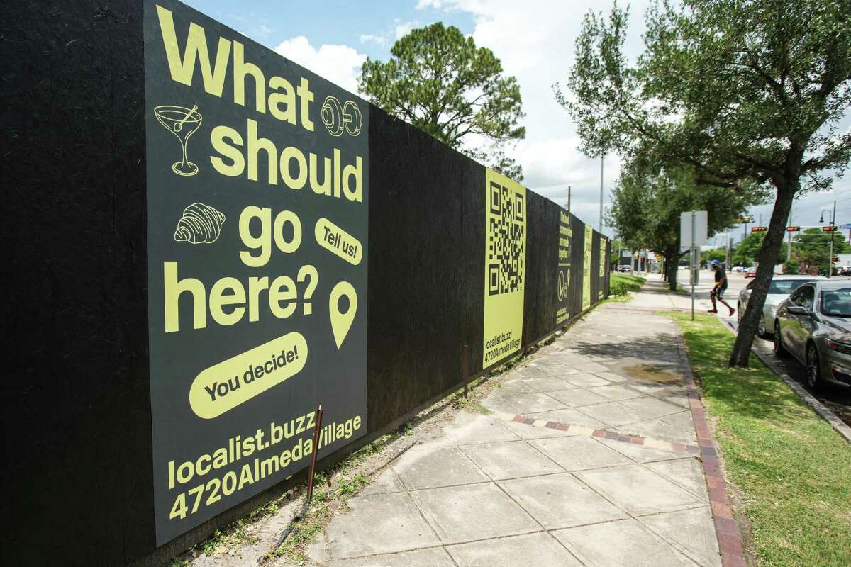 A series of signs line a fence asking the neighborhood on what type of business should be located in the 4700 block of Almeda are shown Thursday, June 2, 2022 in Houston. Two Houston entrepreneurs have created a tool meant to give communities input on what properties should be used for, which The Plant used for feedback.