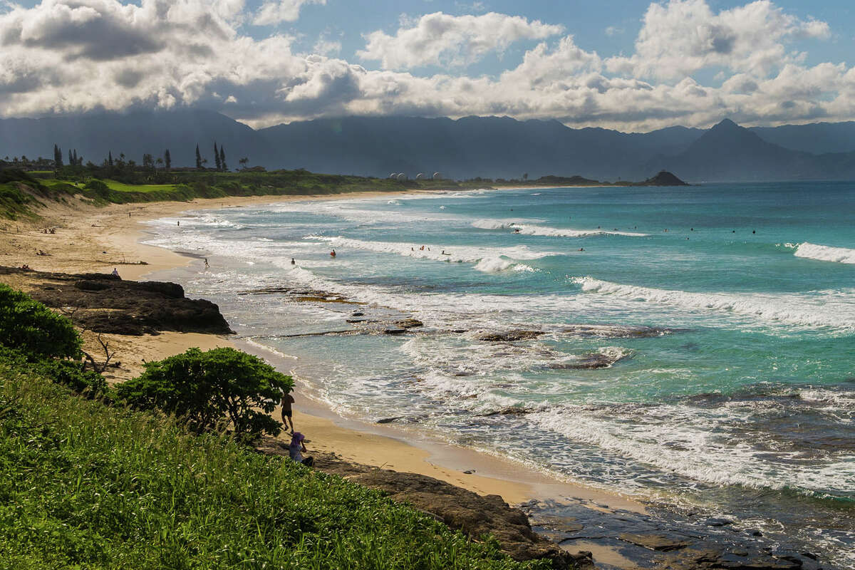 The shoreline of the Mokapu Peninsula, on the Windward side of Oahu, is the location of the largest burial site desecrated in Hawaii. More than a century later, the iwi kupuna (ancestral Hawaiian skeletal remains) that were taken from their final resting places are still waiting to be reburied.
