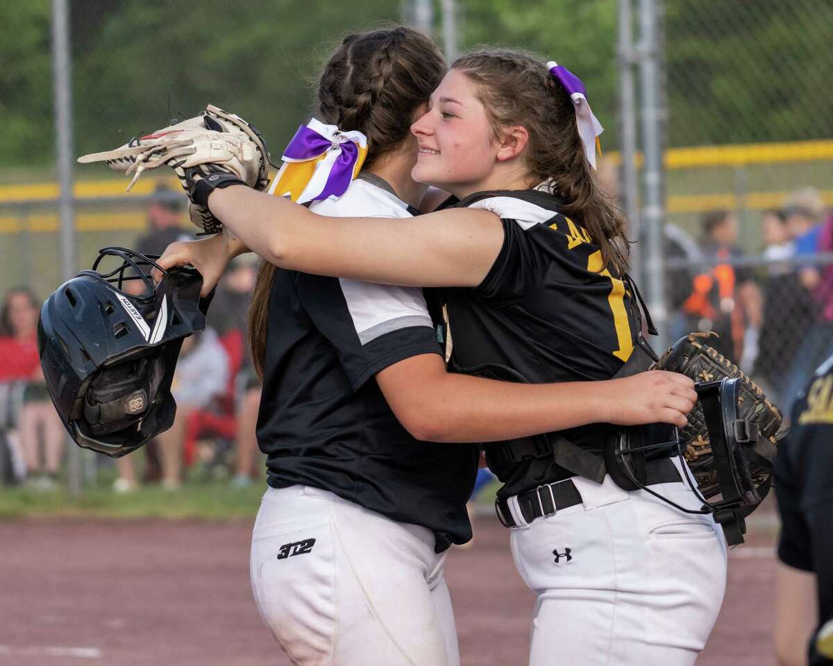 Troy catcher Kierra Laranjo hugs pitcher Olivia Decitise after beating Massena in the Class A state regionals at the Luther Forest Athletic Fields in Malta on Thursday, June 2, 2022. (Jim Franco/Special to the Times Union)