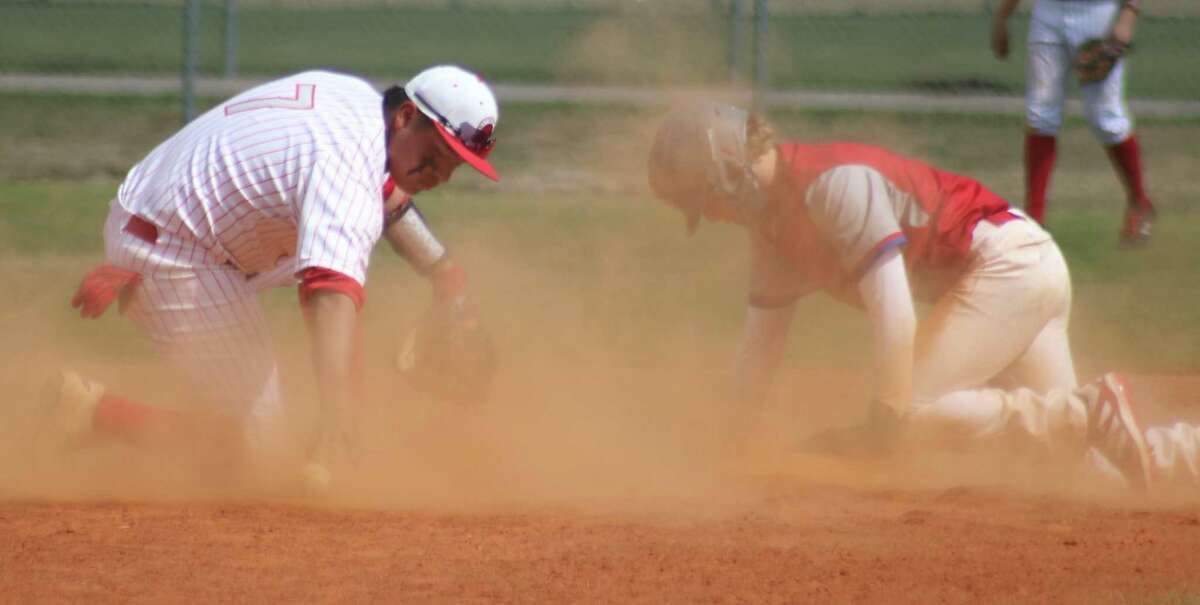 Canon Thompson finishes stealing second base against South Houston during the Pasadena ISD Tournament. Thompson has been voted to the TAPPS All-State Baseball Team for his efforts in guiding the Warriors to the third round of the playoffs this spring.