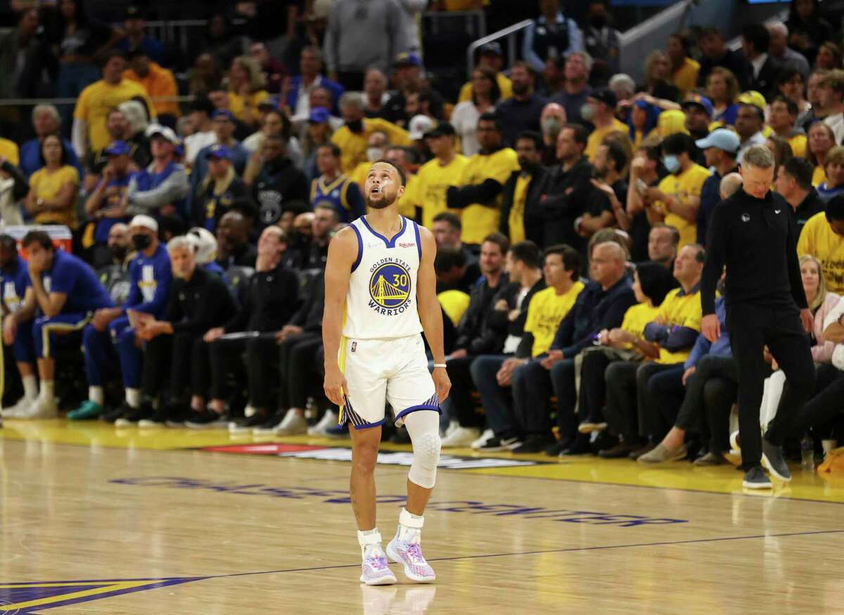 Golden State Warriors' Stephen Curry, 30, looks up at the scoreboard during the fourth quarter of the NBA Finals at Chase Center in San Francisco, Calif., on Thursday, June 2, 2022.