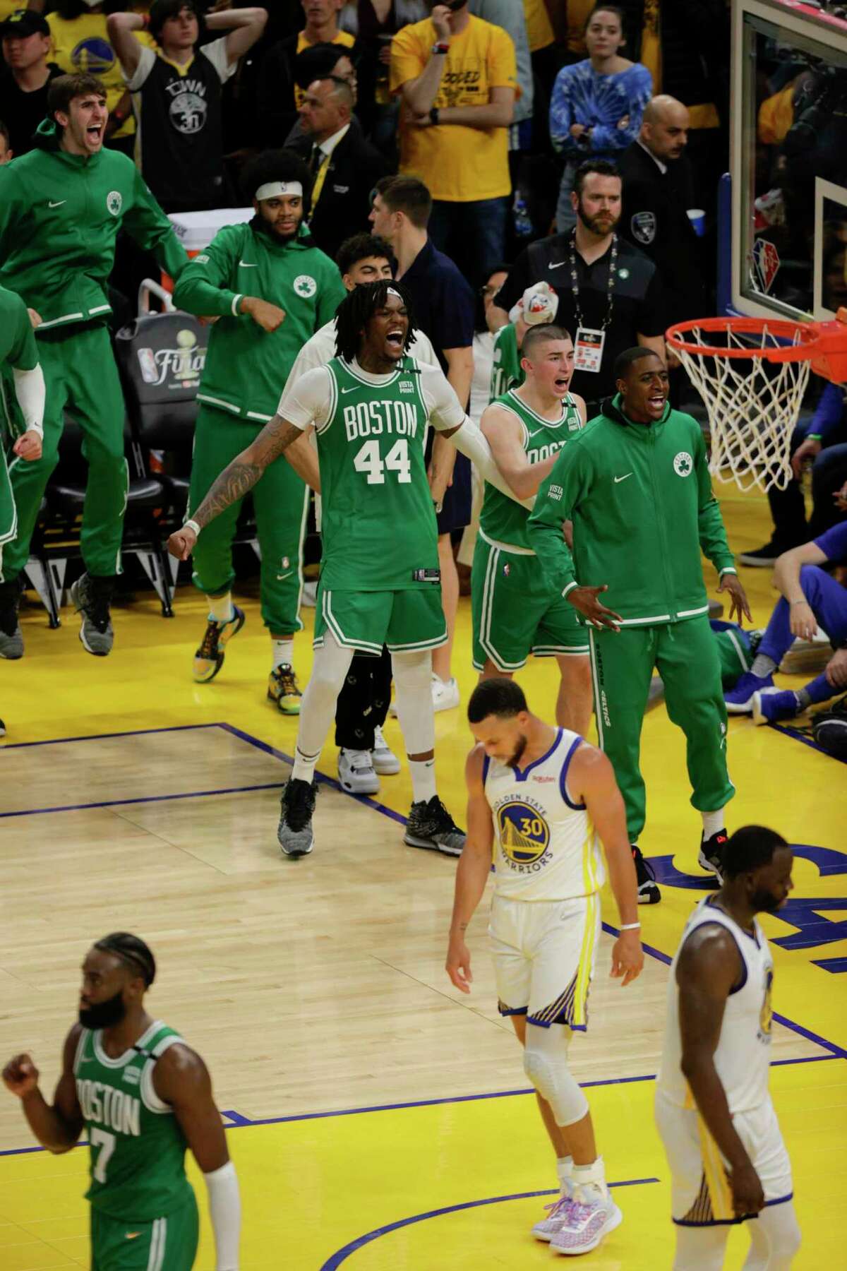 The Boston Celtics celebrate their come from behind win 120 to 108 over the Golden State Warriors in game 1 of the NBA Finals at Chase Center in San Francisco, Calif., on Thursday, June 2, 2022.