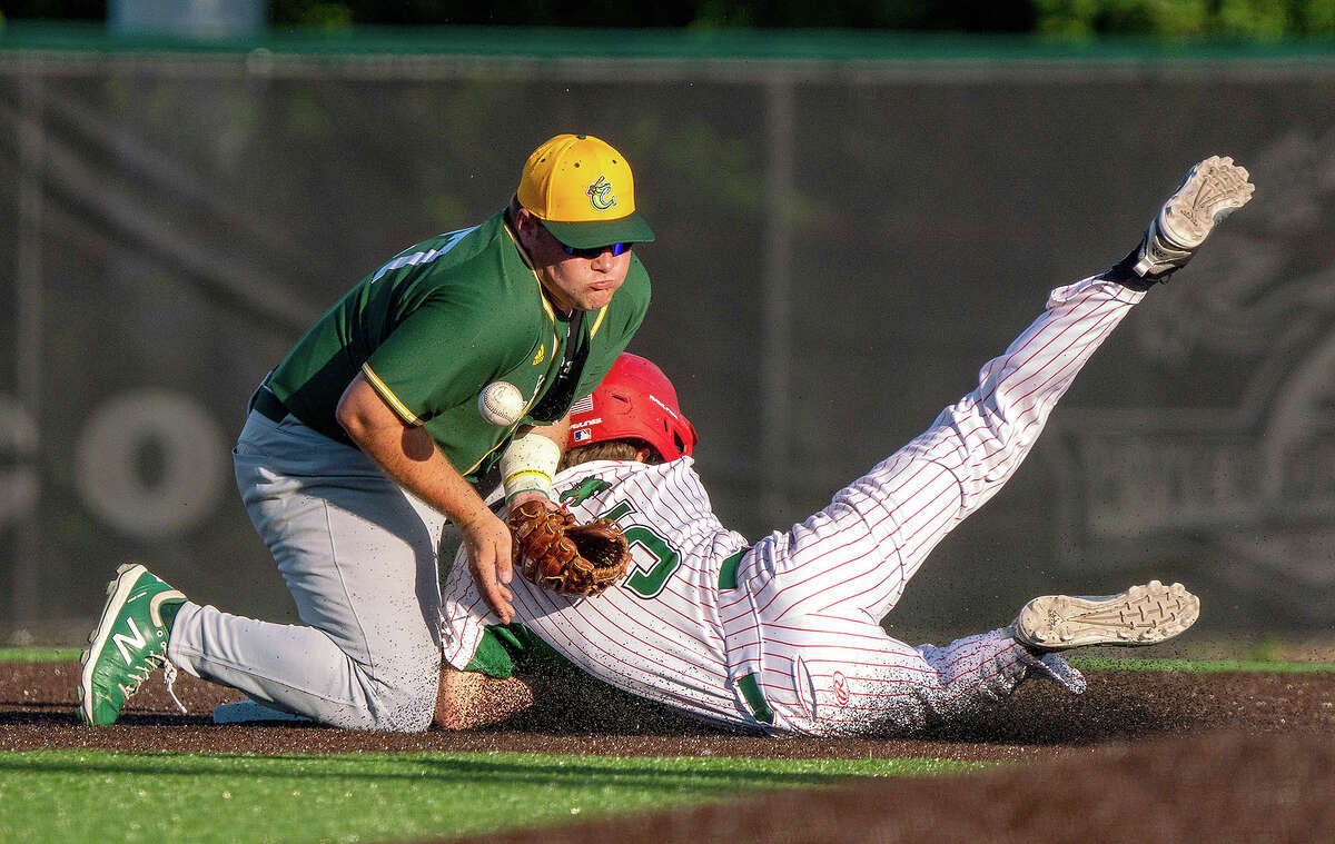 Blake Burris of the Alton River Dragons, right, is safe at second base in Thursday's win over the Cape Girardeau Cape Catfish at Lloyd Hopkins Field. Burris had three hits, including a two-run double in the sixth inning.  He also sealed the game with yet another centerfield diving catch in the ninth inning.