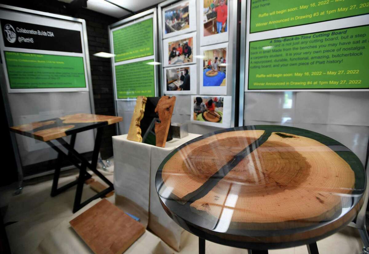 Furniture projects constructed with materials recycled from the school are on display for a fundraising raffle at Platt Tech in Milford, Conn. on Wednesday, June 1, 2022.