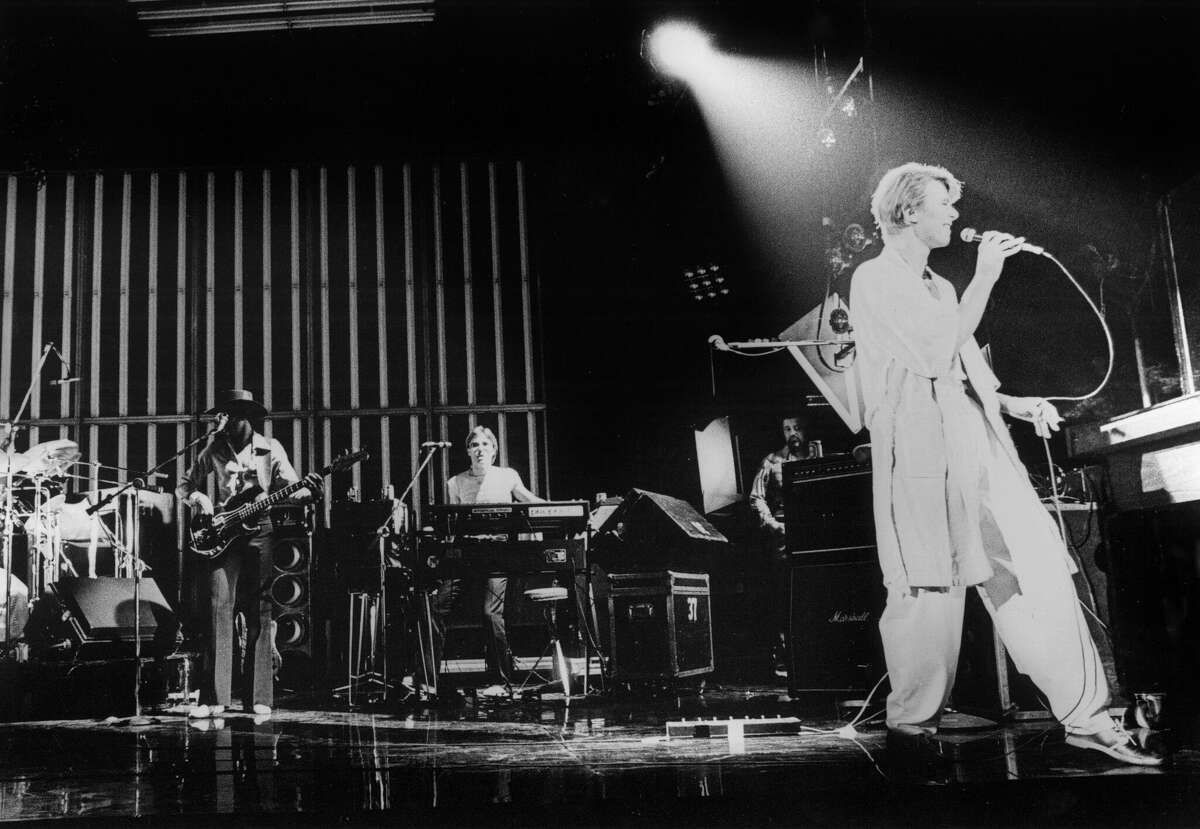David Bowie performs on stage on the Low And Heroes World Tour at Ahoy, Rotterdam, Netherlands on June 7, 1978, with keyboardist Roger Powell playing a Prophet-5 synthesizer.