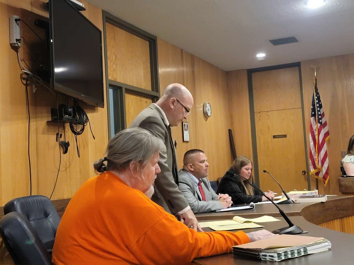 During a June 3 preliminary hearing, Anthony Cicchelli (middle left) tells Judge John Mead he does not believe there is motive or sufficient evidence to show his client, Robert Michael Freebold, commited murder on Nov.20.