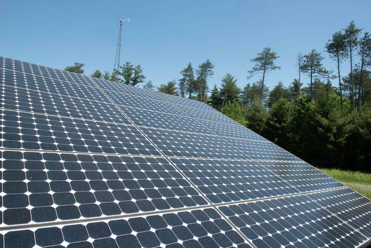 Solar panels are seen outside Hudson Valley Community College North on Friday, June 3, 2022 in Ballston Spa, N.Y. Fees paid to the state when agricultural land is converted into solar farms will now go to preserving other farmland.