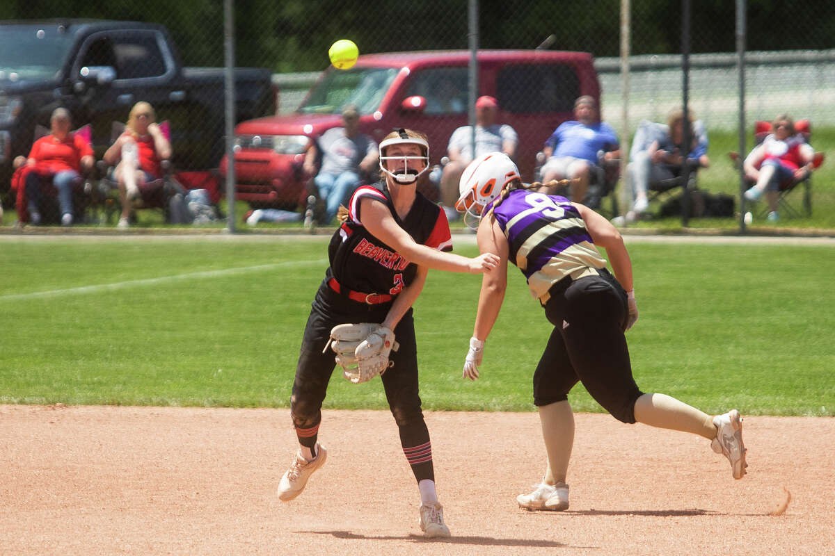 Beaverton's Alexis Grove throws the ball to first base during a district semifinal against Farwell Friday, June 3, 2022 at Meridian Early College High School.