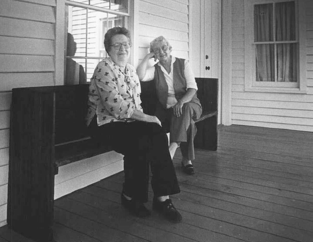 The History Taskforce of Montgomery County recently finished the digitizing of a large collection of history documents from Bessie Price Owen. Owen died in 2004, but the many photos, documents, wills, cattle brands and more were passed on to her niece, Catherine. Pictured are Montgomery historians Anna Davis Weisinger and Bessie Price Owen on the porch of the Arnold-Simonton House. The date of the photo is unknown.