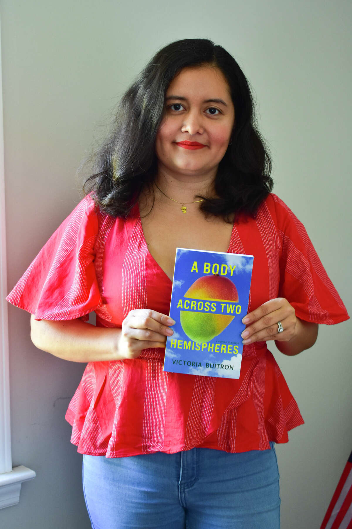Victoria Buitron, Ecuadorian author, at her home in Norwalk on April 9, 2022. Buitron published her memoir "A Body Across Two Hemispheres" in late March. 