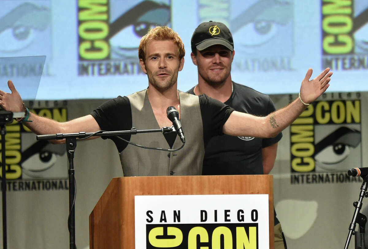 SAN DIEGO, CA - JULY 26: Actors Matt Ryan (L) and Stephen Amell attend Warner Bros. Television & DC Entertainment world premiere presentation during Comic-Con International 2014 at San Diego Convention Center on July 26, 2014 in San Diego, California. (Photo by Kevin Winter/Getty Images)