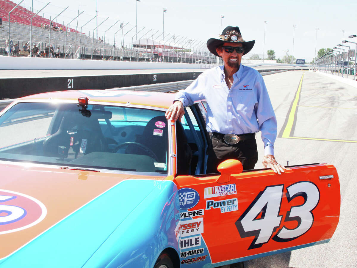 NASCAR legend Richard Petty poses before getting behind the wheel of one of his cars at World Wide Technology Raceway during opening ceremonies for a three-day 'NASCAR weekend' June 3-5 that included the Toyota 200 Camping World Truck Series and the inaugural Enjoy Illinois 300 NASCAR Cup Series race. The Friday-through-Sunday event started with 'Richard Petty Day' on Friday.