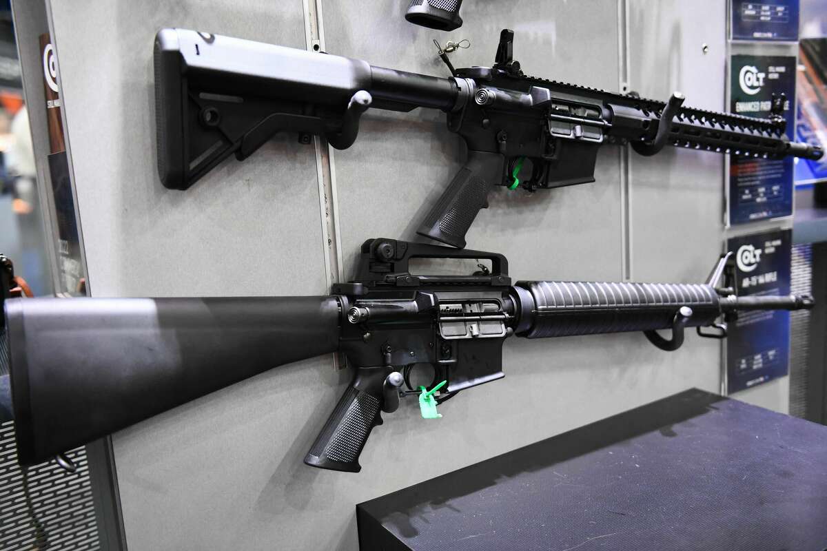 Colt M4 Carbine and AR-15 style rifles are displayed during the National Rifle Association (NRA) Annual Meeting at the George R. Brown Convention Center, in Houston, Texas on May 28, 2022.