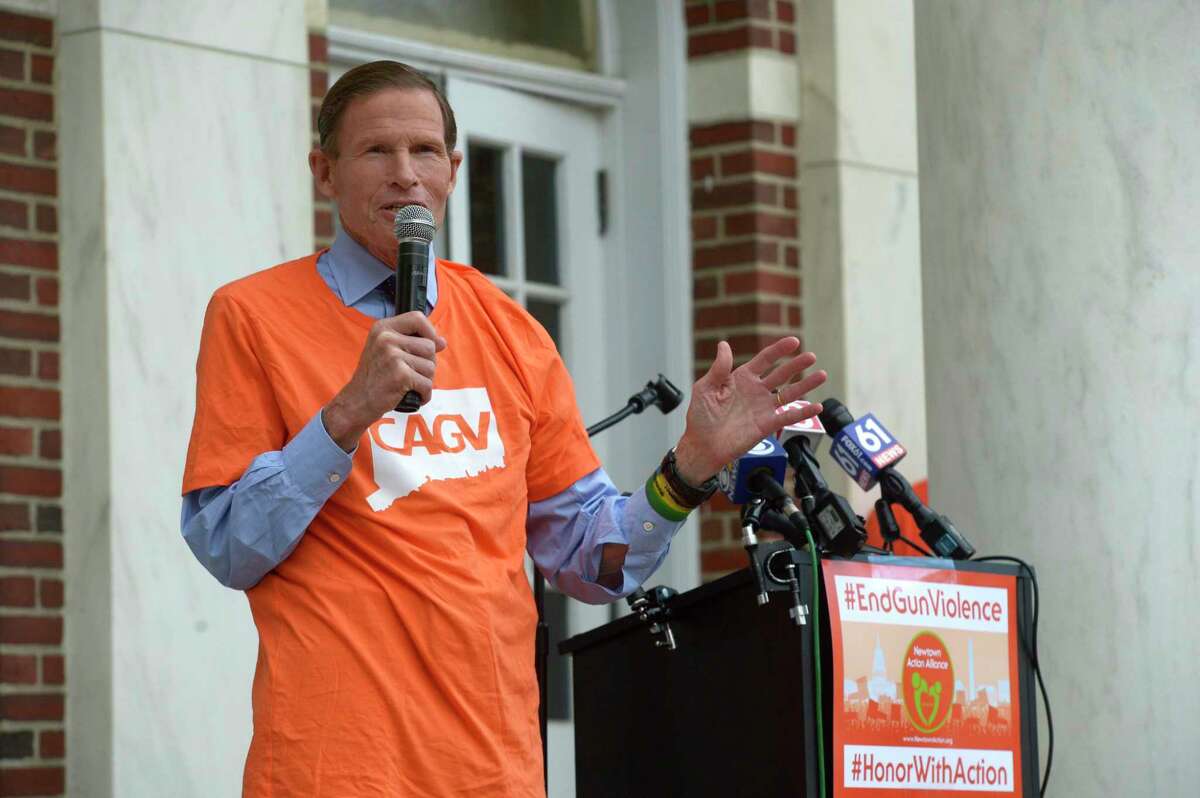U.S. Senator Richard Blumenthal speaks at a rally for action that was held on Friday evening in front of Edmond Town Hall on National Gun Violence Awareness Day in Newtown.