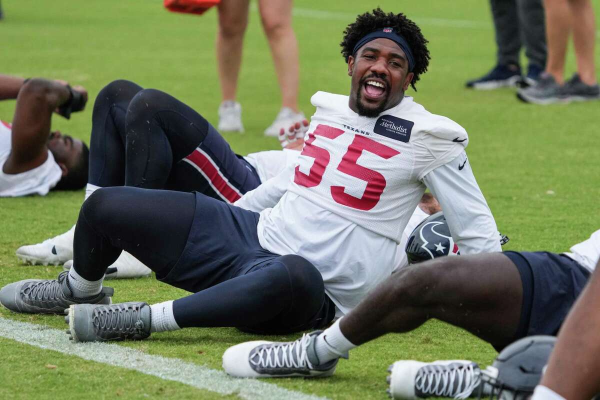 Houston Texans defensive lineman Jerry Hughes (55) stretches during OTAs Tuesday, May 24, 2022, at Houston Methodist Training Center in Houston.