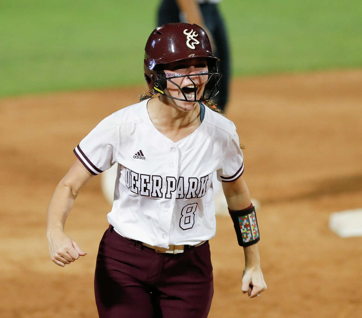 Lorelei Graham #8 of Deer Park reacts after hitting a two-run home run off Lake Ridge starting pitcher Avery Hoang Deer Park in the fifth inning of a Class 6A semifinal game during the UIL State Softball Championships at Red & Charline McCombs Field, Friday, June 3, 2022, Austin.