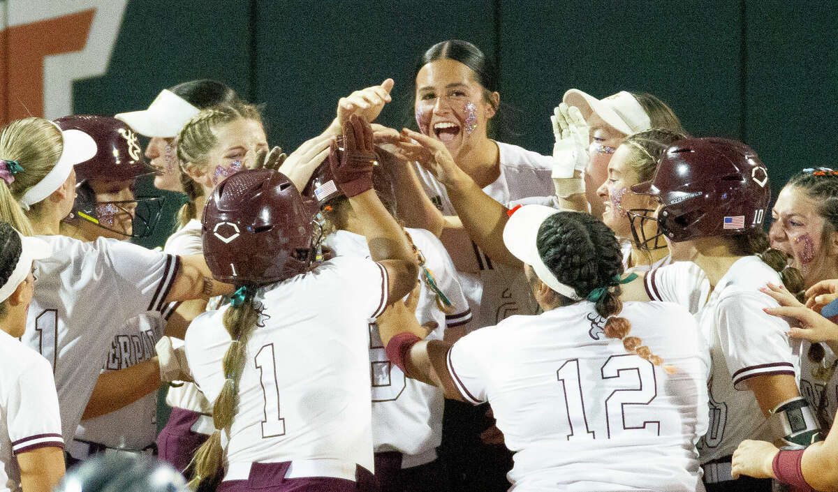 Deer Park players celebrate after Lorelei Graham's two-run home run off Lake Ridge starting pitcher Avery Hoang Deer Park in the fifth inning of a Class 6A semifinal game during the UIL State Softball Championships at Red & Charline McCombs Field, Friday, June 3, 2022, Austin.