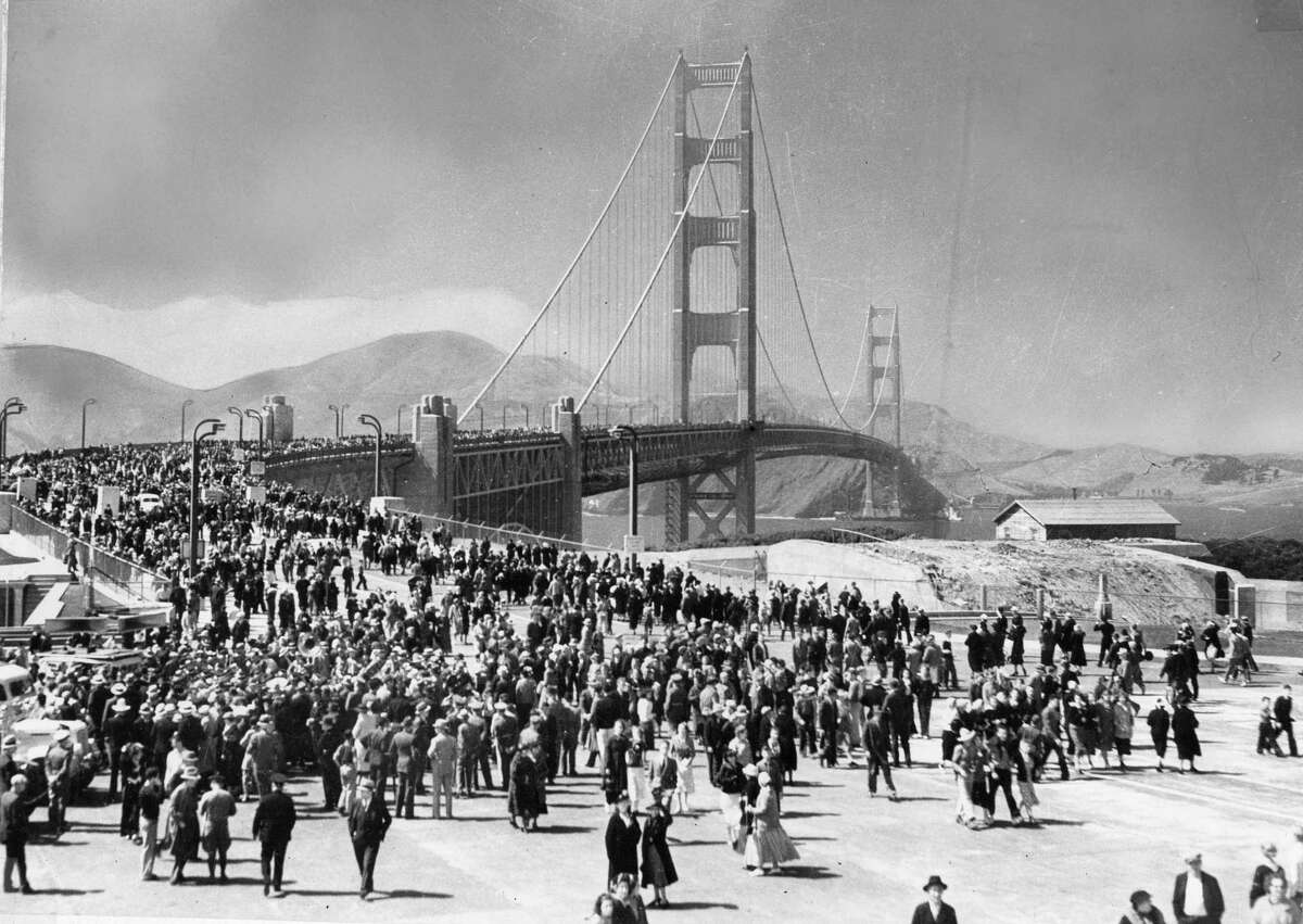 Walkers take advantage of Pedestrian Day, the first of two opening days for the Golden Gate Bridge, on May 27, 1937.