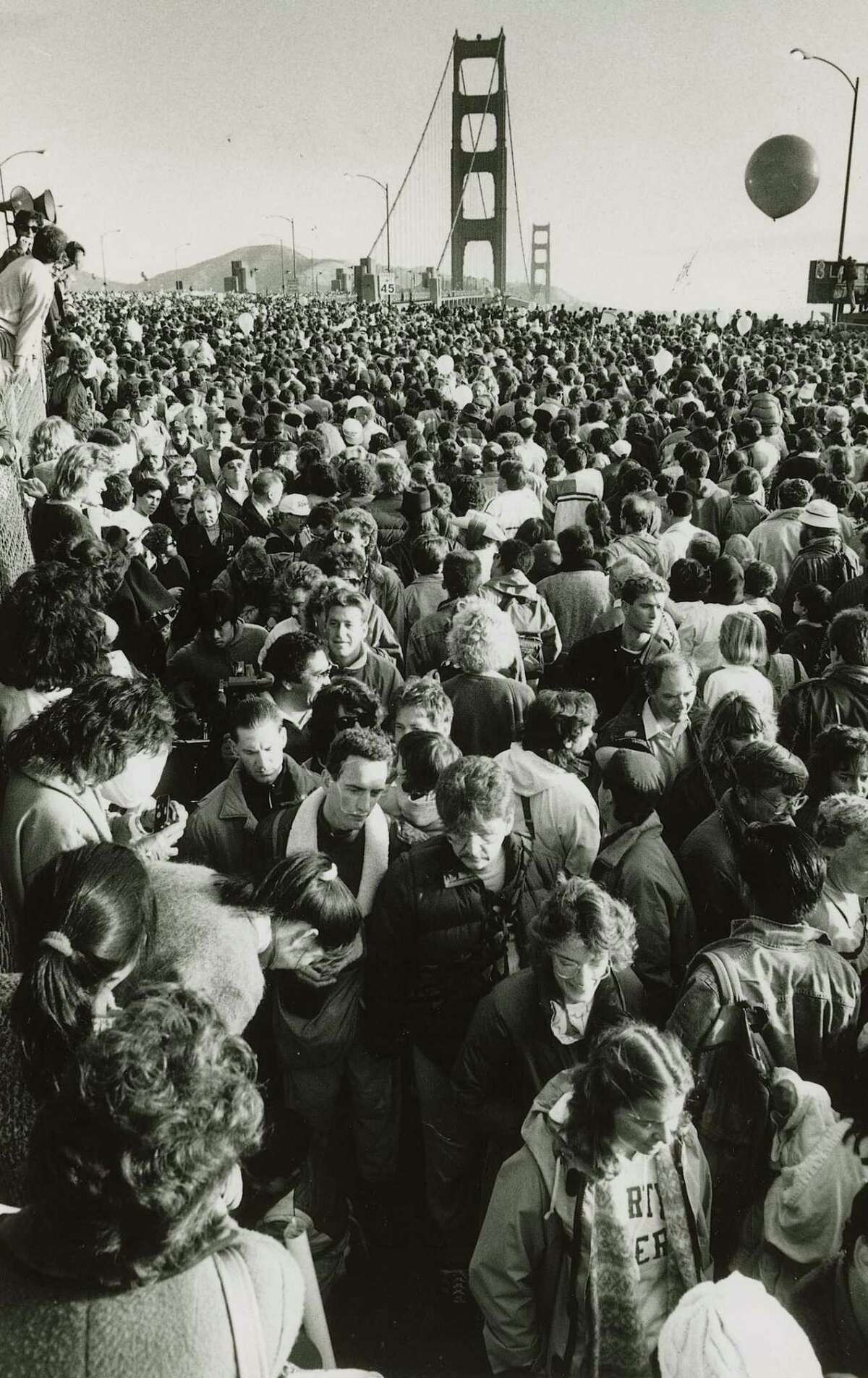 A mass of people gather at the south end of the Golden Gate Bridge for the 50th anniversary celebration on May 24, 1987.