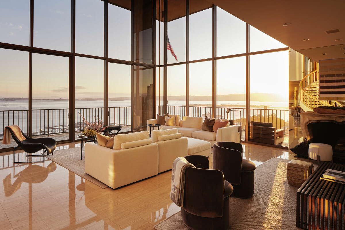 In the north penthouse, the view towards the North Bay is framed in a tower of glass.