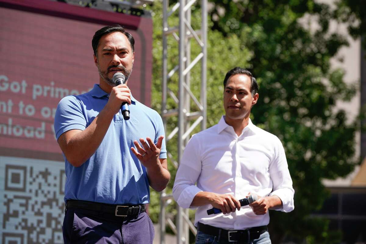 Congressman Joaquin Castro and his brother Julian, former San Antonio Mayor and former Secretary of Housing and Urban Development speak to the crowd during a "Stand with Uvalde" call to action rally Saturday morning in Travis Park.