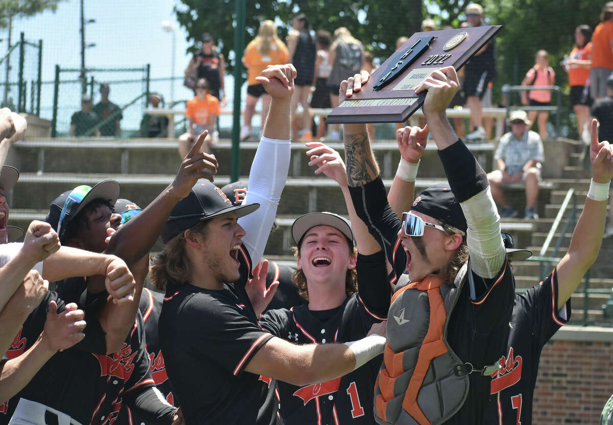 Edwardsville celebrates its win against Minooka in the Class 4A Illinois Wesleyan Sectional championship game on Saturday in Bloomington.