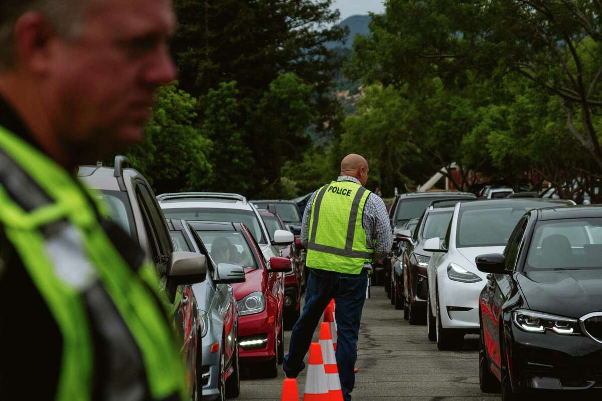 Traffic near the anonymous gun buyback program at the Marin County Sheriff’s Office.