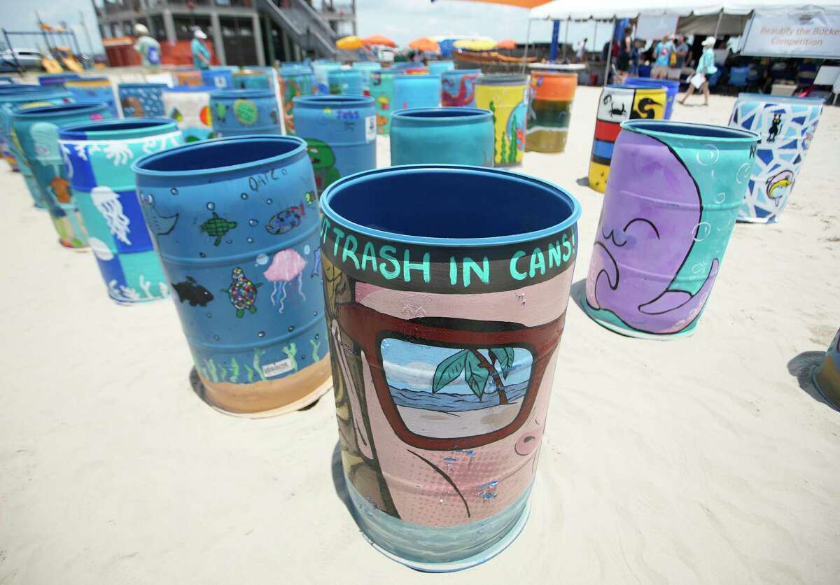 Painted trash barrels on display as Artist Boat and Odyssey Academy hosted a “Beauty the Bucket” competition during the World Ocean Day Festival on the East Beach on Saturday, June 4, 2022 in Galveston. The theme for World Ocean Day was focused on restoring the vibrancy and balance in the Ocean. After the competition, the barrels will be added to Galveston Beaches where they will be used and viewed by visitors, and encourage proper disposal of trash to reduce aquatic trash.