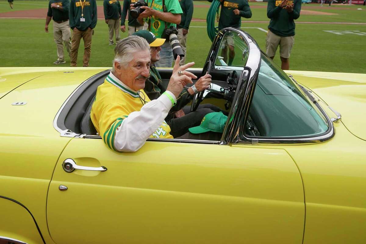 Rollie Fingers waves during a celebration of the Oakland Athletics' 1972 World Series winning team before a baseball game between the Athletics and the Boston Red Sox in Oakland, Calif., Saturday, June 4, 2022. (AP Photo/Jeff Chiu)