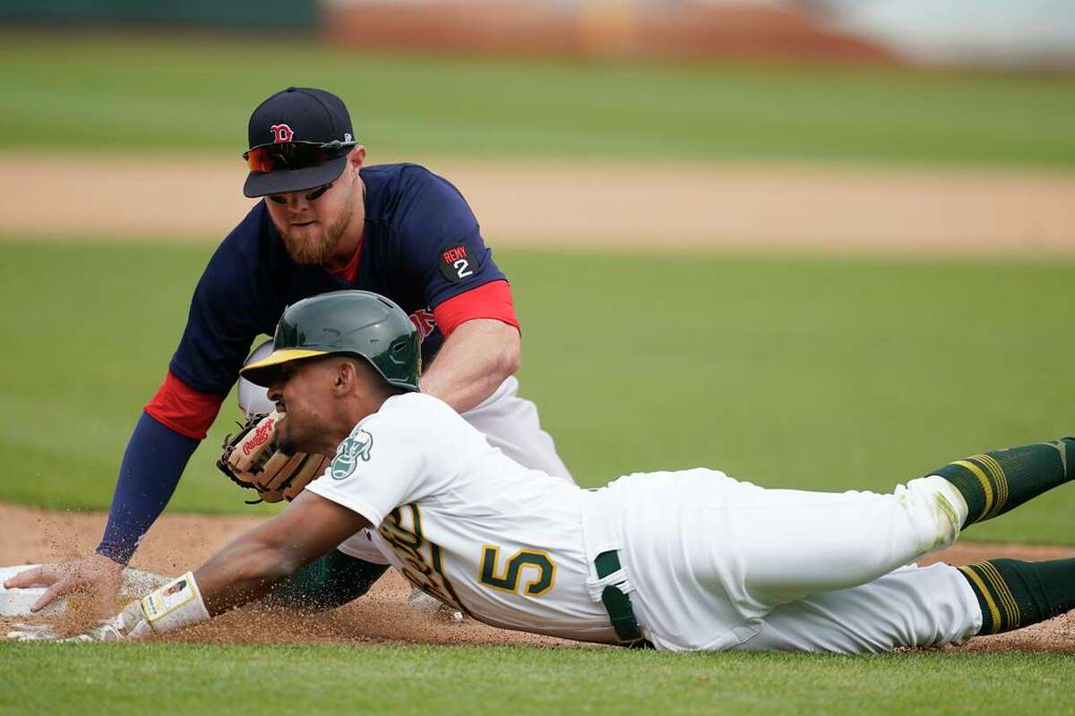 Red Sox 2B Trevor Story hit in hand while swinging, leaves game