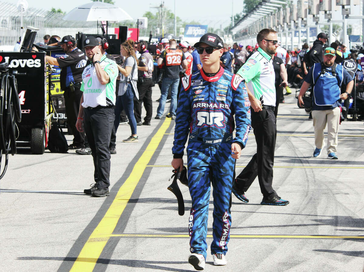 Chris Buescher heads toward his car for qualifying  for the inuagural Enjoy Illinois 300 set for Sunday at World Wide Technology Raceway in Madison. Track officials said they were very happy with the event, and are making plans for next year's race.