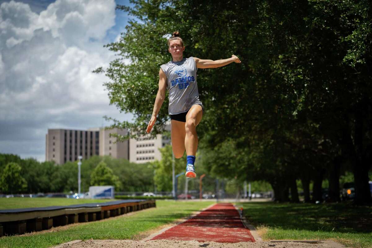 Kaitlin Smith trains on her long jump, Thursday, June 2, 2022, at Houston Baptist University in Houston. Smith will be competing in the heptathlon next week in Oregon at the 2022 NCAA outdoor track and field championships.