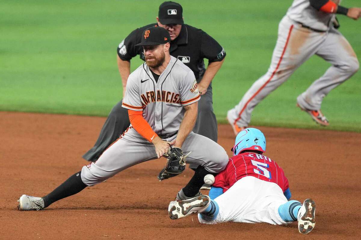 MIAMI, FLORIDA - JUNE 04: Jon Berti #5 of the Miami Marlins steals second base in the fifth inning against the San Francisco Giants at loanDepot park on June 04, 2022 in Miami, Florida. (Photo by Eric Espada/Getty Images)
