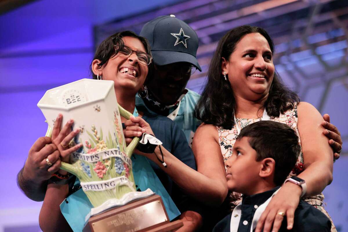 Harini Logan celebrates with her family after winning the Scripps National Spelling Bee on June 2, 2022. By getting 21 words right in a first-ever spell-off finale, Logan won the 2022 bee.