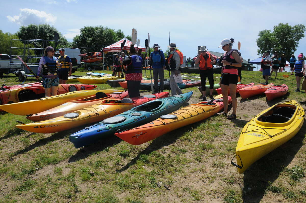 The next set of Paddlefest participants gets ready to try out some kayaks during Saturday's event.   