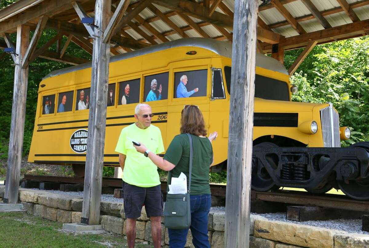 A replica of The Dinky was unveiled Saturday in Grafton. The original vehicle was a city bus configured with wheels for railroad tracks that ran between Grafton and Alton.