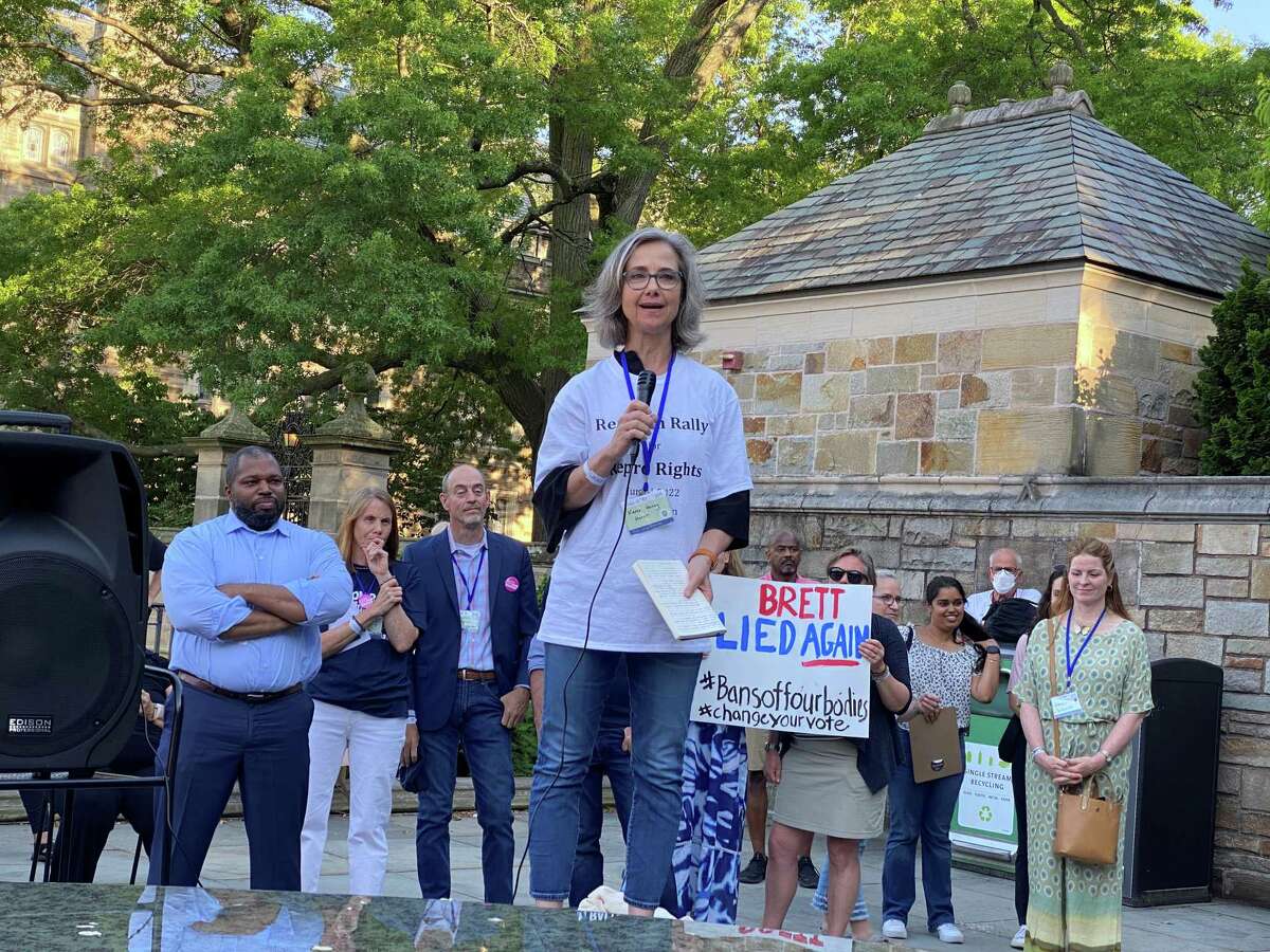 Dr. Karen Horst addresses rally on abortion rights at Yale University. They asked their Yale classmate Supreme Court Justice Brett Kavanaugh to support Roe v. Wade. From left is state Senator Gary Winfield, Kathy Charlton and James Esseks.