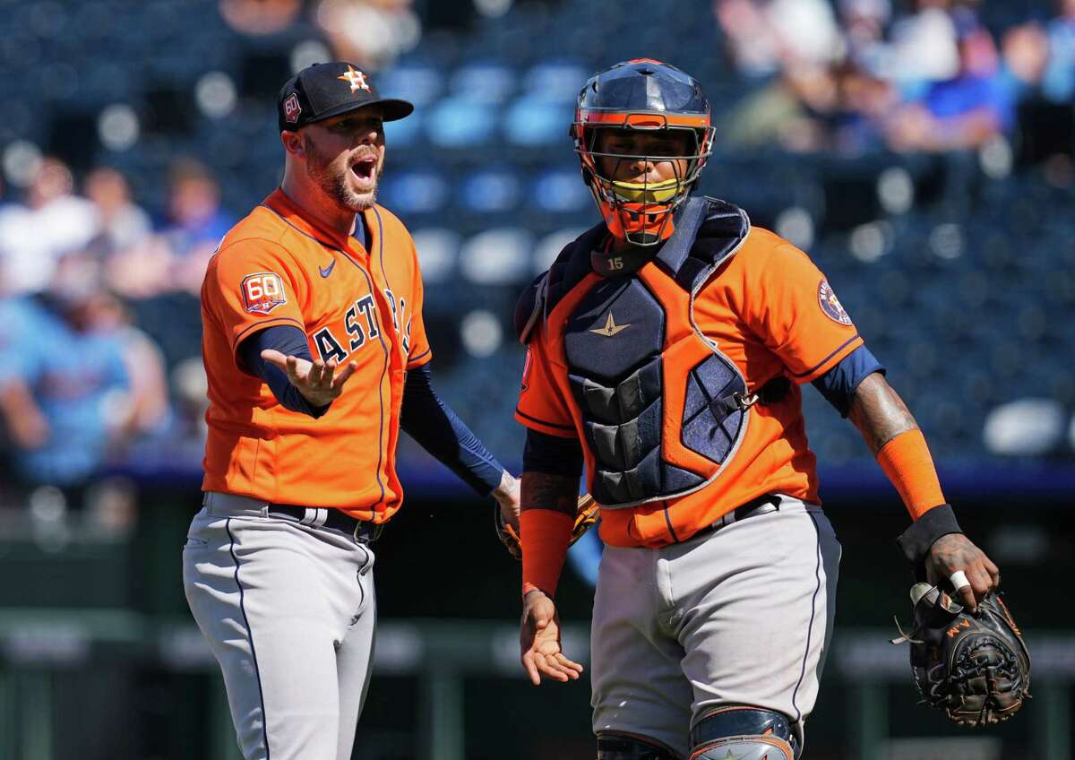 KANSAS CITY, MO - JUNE 05: Ryan Pressly #55 of the Houston Astros and Martin Maldonado #15 react after Pressly is ejected during the ninth inning against the Kansas City Royals at Kauffman Stadium on June 5, 2022 in Kansas City, Missouri.