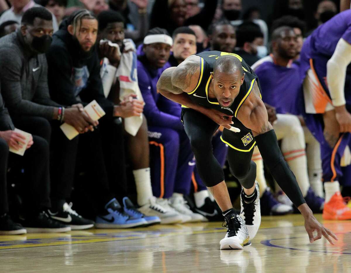 Andre Iguodala (9) gestures after hitting a three point shot as the Golden State Warriors played the Phoenix Suns at Chase Center in San Francisco, Calif., on Wednesday, March 30, 2022.