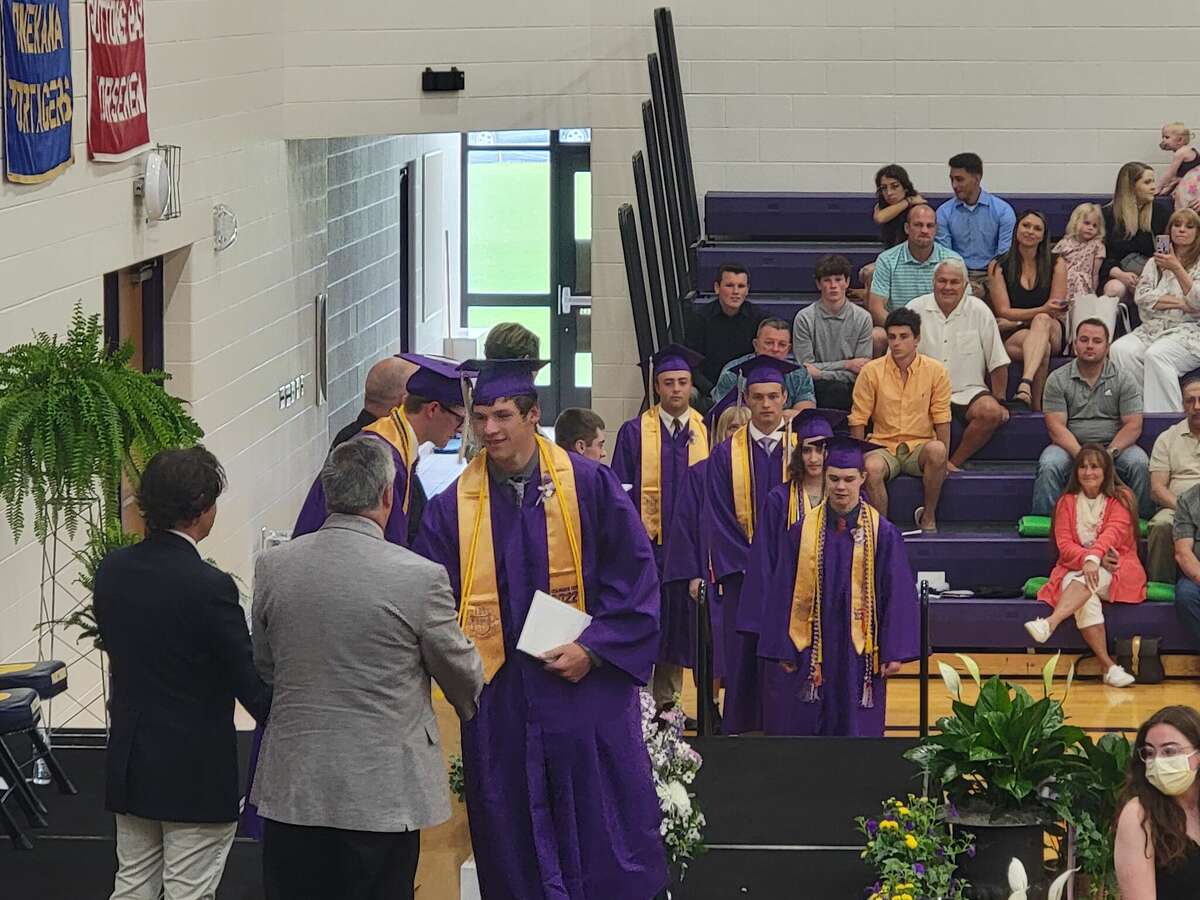 Frankfort students line up to get their high school diploma during their last moments as students at Frankfort High School. 