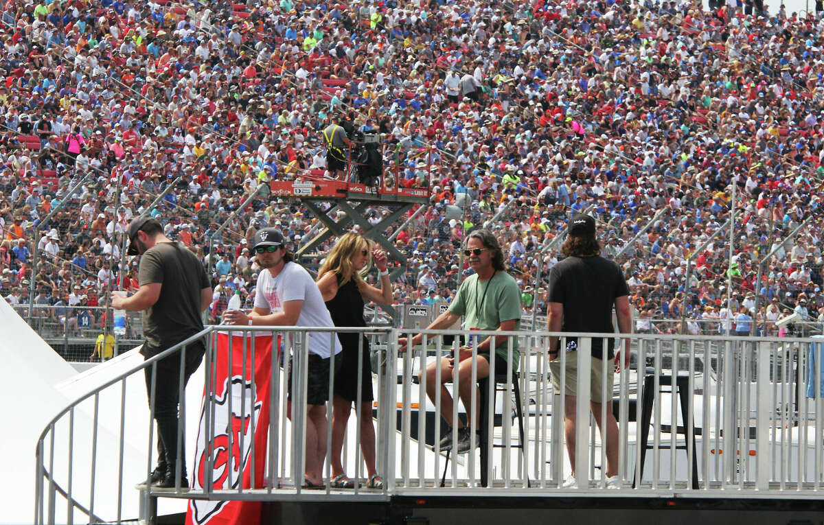 Fans watch the inaugural Enjoy Illinois 300 NASCAR Cup series from the top of a recreational vehicle in the infield near Turn 1 of World Wide Technology Raceway in Madison. Track officials said the race weekend was a major success, and they are already planning for next year's event.