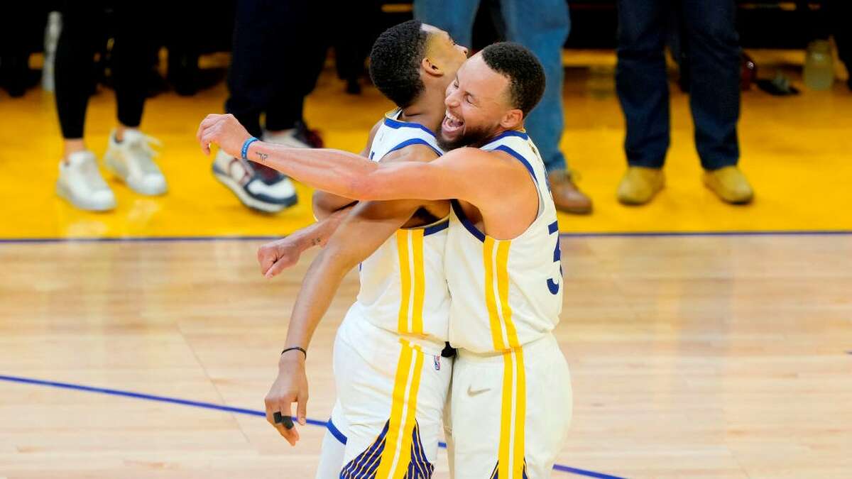 Jordan Poole and Steph Curry celebrate Poole's shot in Game Two of the 2022 NBA Finals at Chase Center on June 05, 2022 in San Francisco, California.