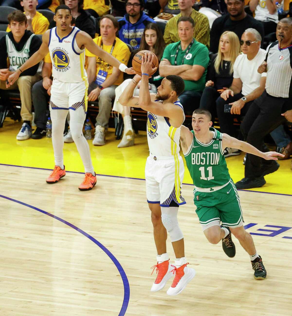 Golden State Warriors' Stephen Curry, 30, shoots a three pointer during the first quarter of the NBA Finals at Chase Center in San Francisco, Calif., on Sunday, June 5, 2022.