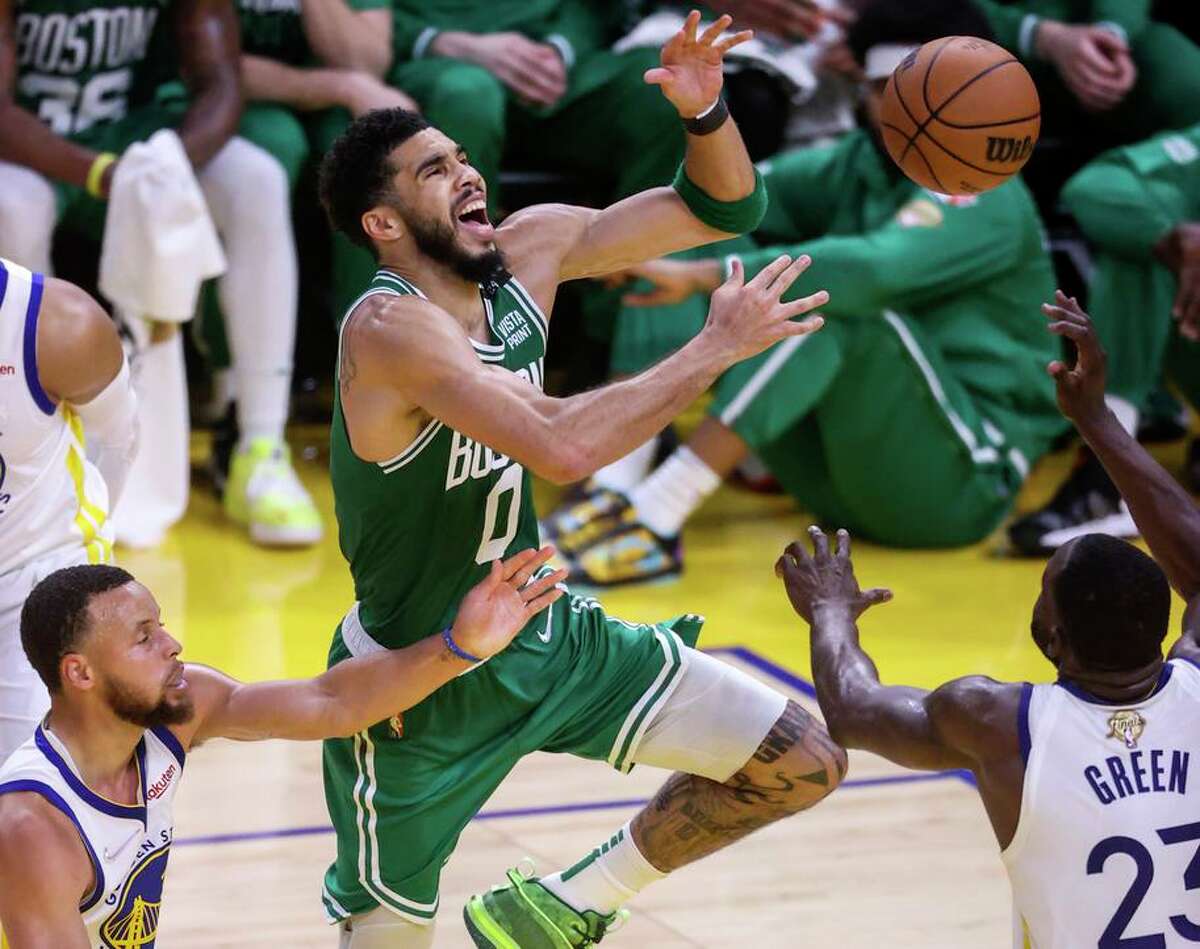Boston Celtics' Jayson Tatum, 0, loses control of the ball during the third quarter of the NBA Finals at Chase Center in San Francisco, Calif., on Sunday, June 5, 2022.