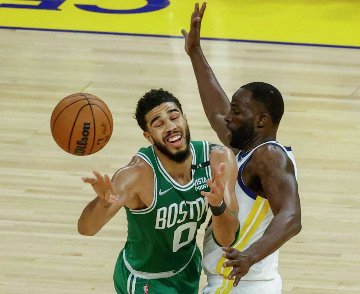 Golden State Warriors' Draymond Green, 23, stops Boston Celtics' Jayson Tatum, 0, during the second quarter of the NBA Finals at Chase Center in San Francisco, Calif., on Sunday, June 5, 2022.