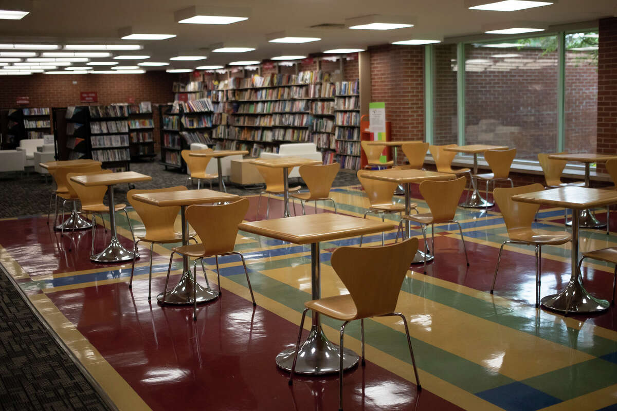Ready, set, read! Midland library reopens Patrons explore new areas