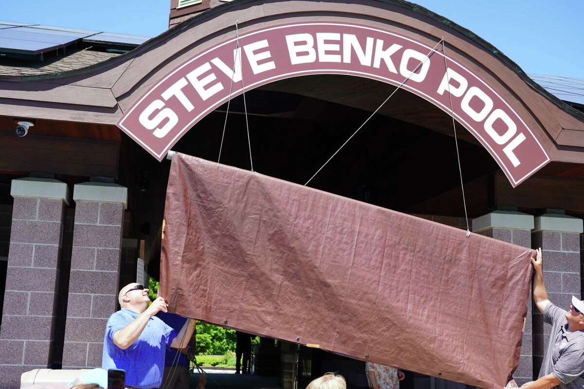 The Steve Benko Pool sign was unveiled at a dedication ceremony in Waveny Park in New Canaan on June, 4, 2022 for the recreation director's 50 years of service to the town.