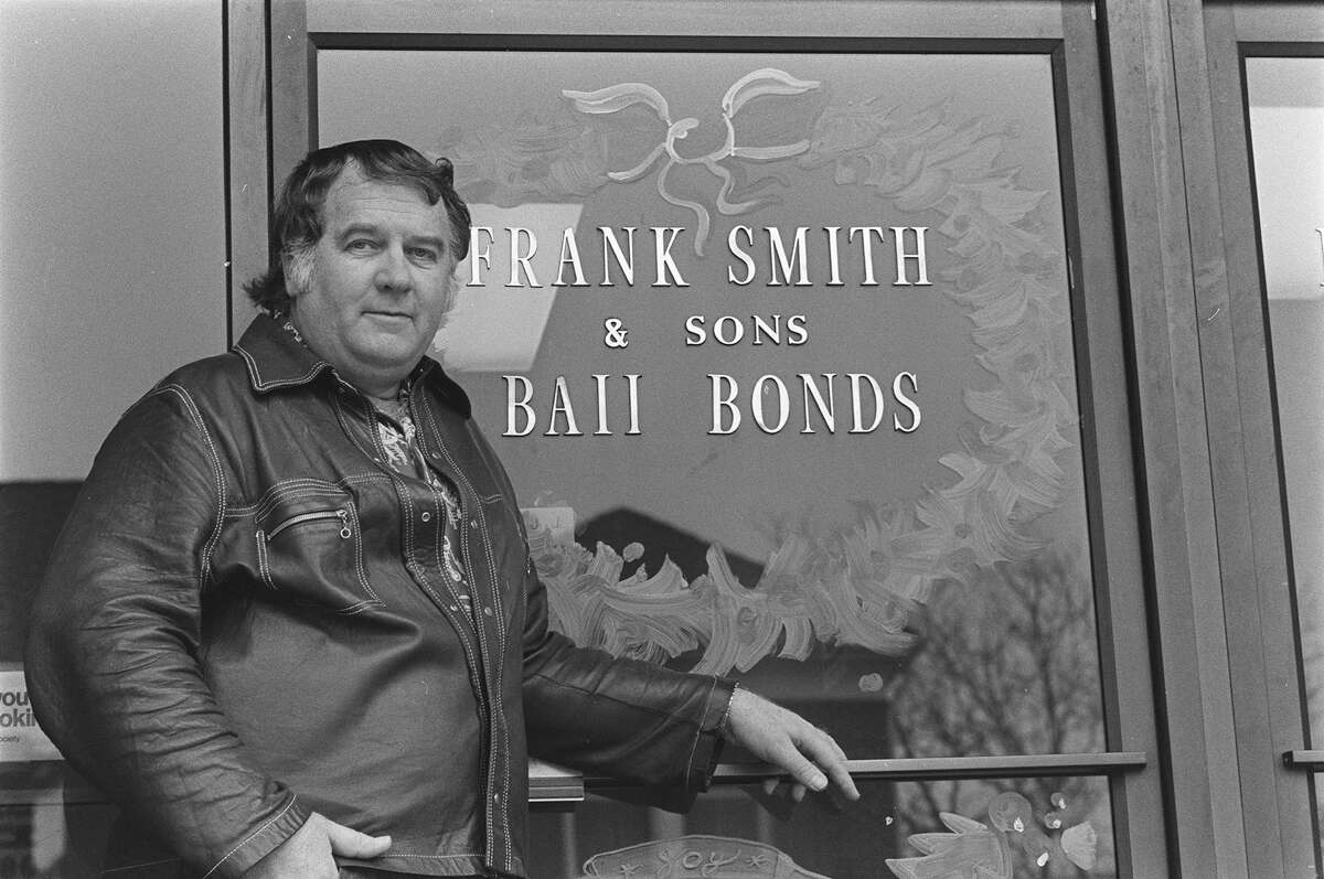 Frank Smith was still on federal parole when his bail bond license was approved. Note that the word “bail” is misspelled on the office window. 