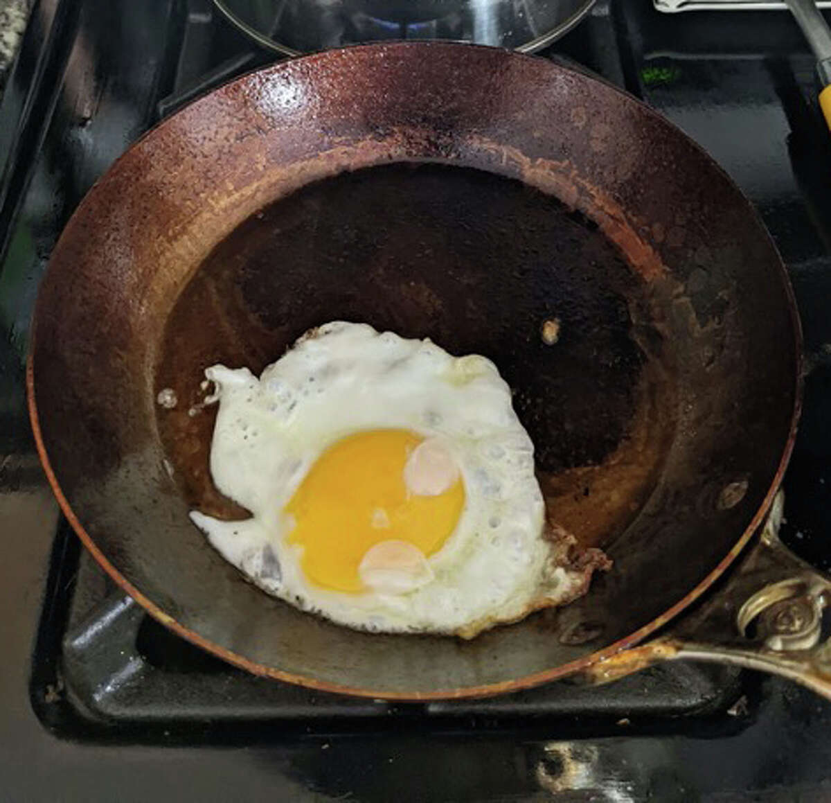 Fried eggs are a bit of a glove for any pan